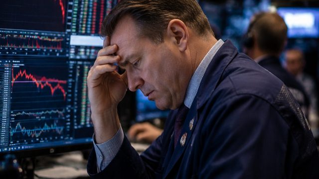 Wall Street Experiences Dip Amid AI Spending Worries and Tech Selloff